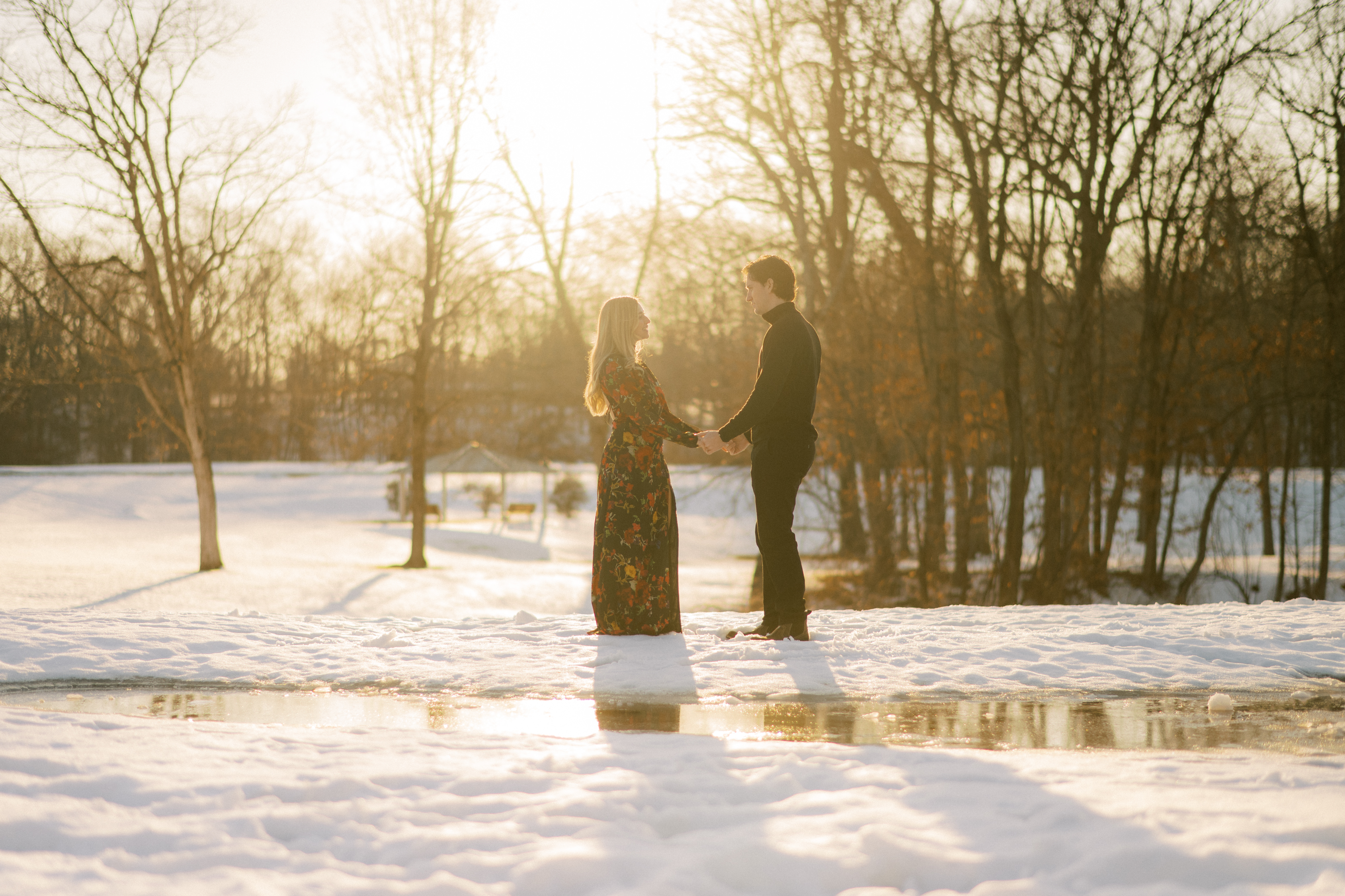 Holding hands at sunset